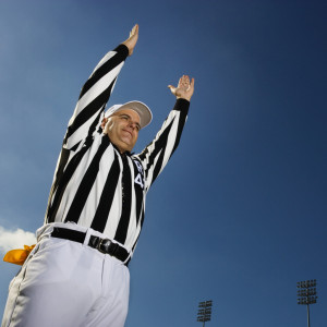 Referee Signaling Score --- Image by © Royalty-Free/Corbis