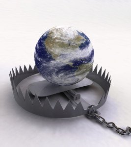 An globe of the Earth sits perilously on a steel-jaw trap
